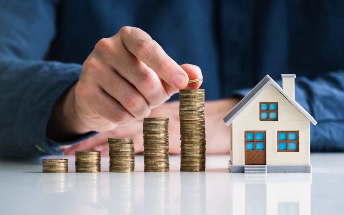 Investing in real estate: buying residential or commercial real estate as a source of income